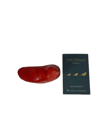 petit oiseau rouge en céramique